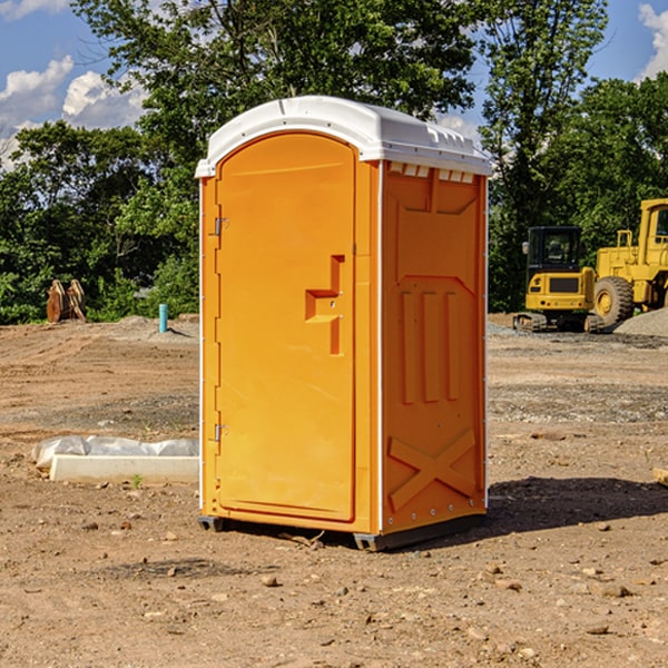 what is the cost difference between standard and deluxe portable restroom rentals in Bevinsville